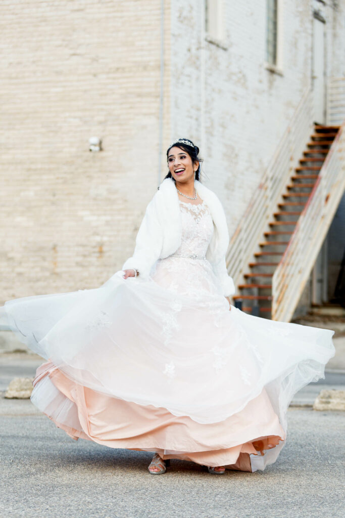 Bride playing with her dress