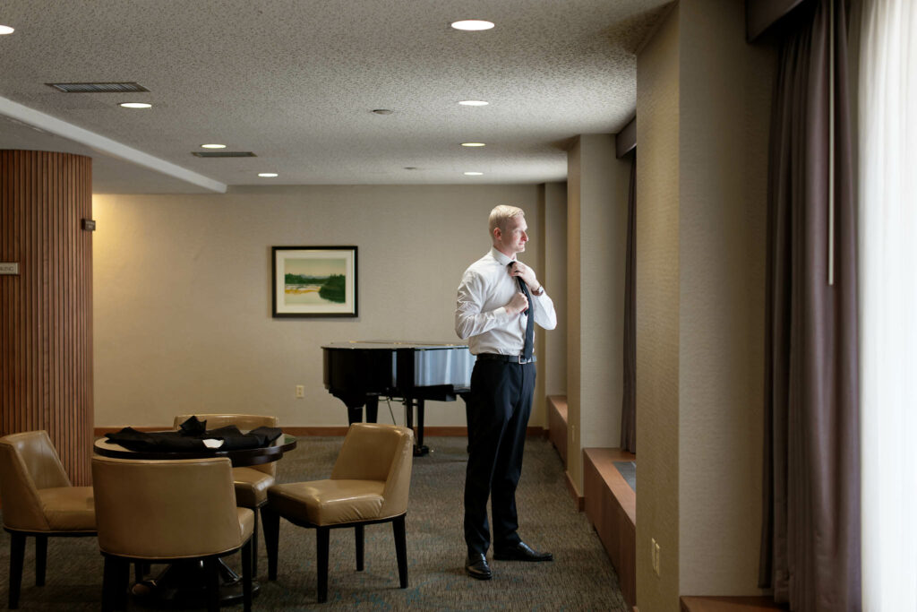 Groom getting ready Kahler Grand Hotel Rochester MN