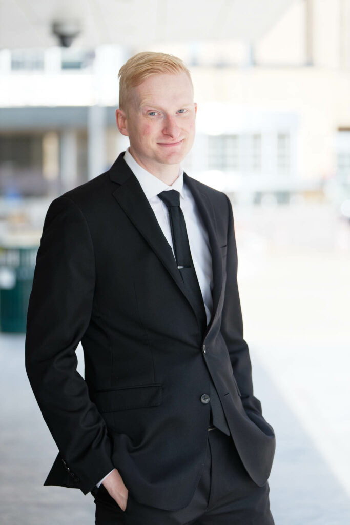 Individual picture of the groom in front of Mayo Clinic Siebens building-3