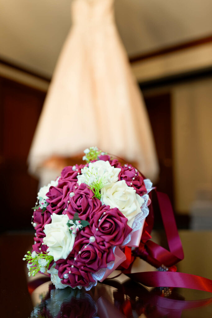 Preparation of the bride detail of the bouquet and the dress