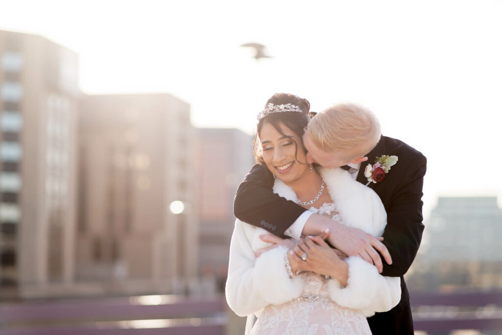 Sunset portrait on the rooftop bride and groom