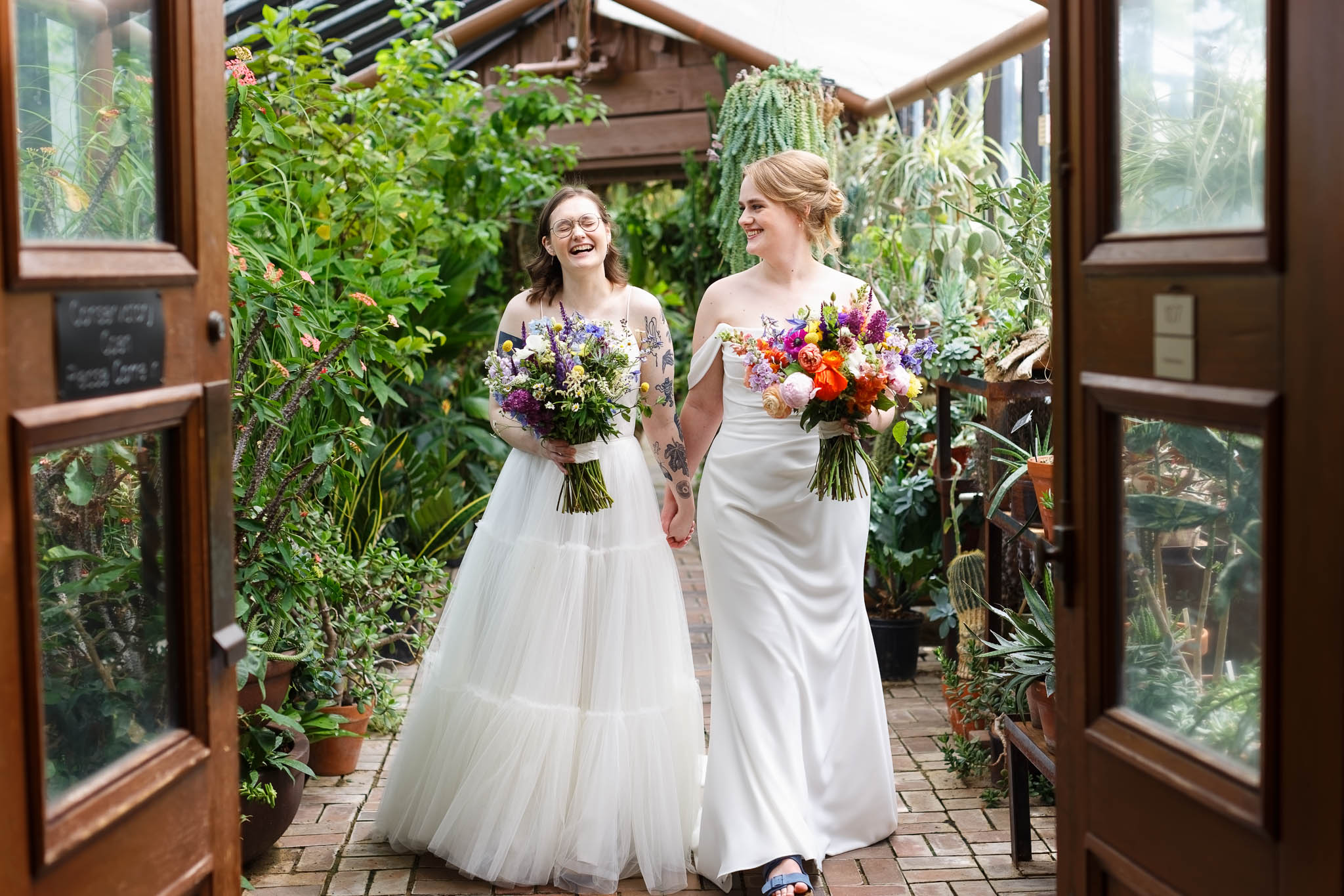 lesbian couple white dresses