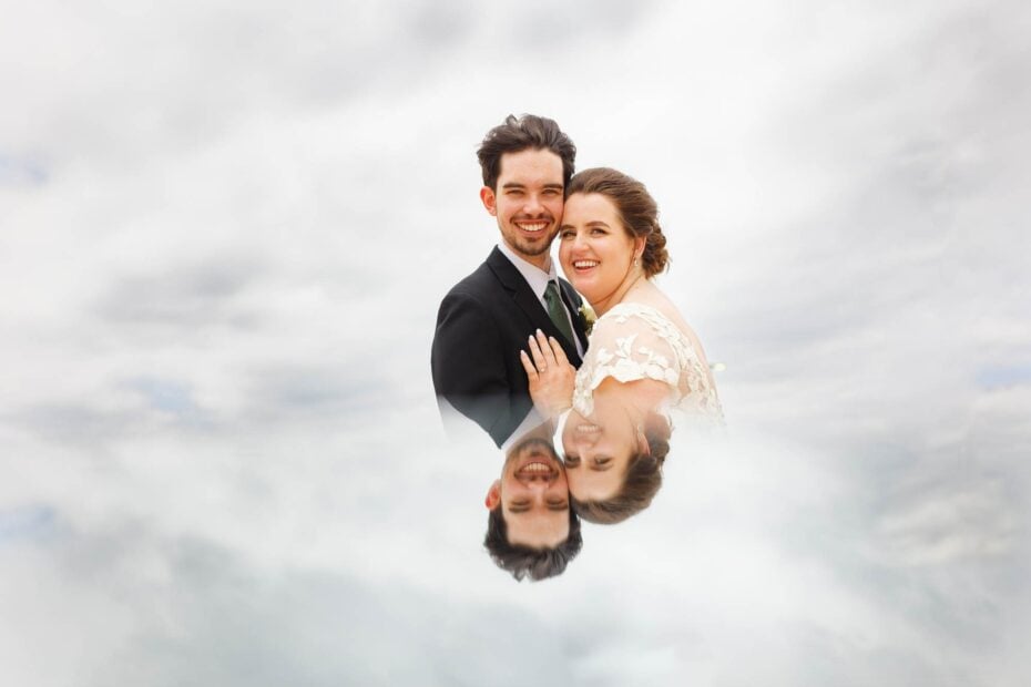 Creative image of the brighten, the groom, their heads in the sky for wedding at Marriott Rochester MN