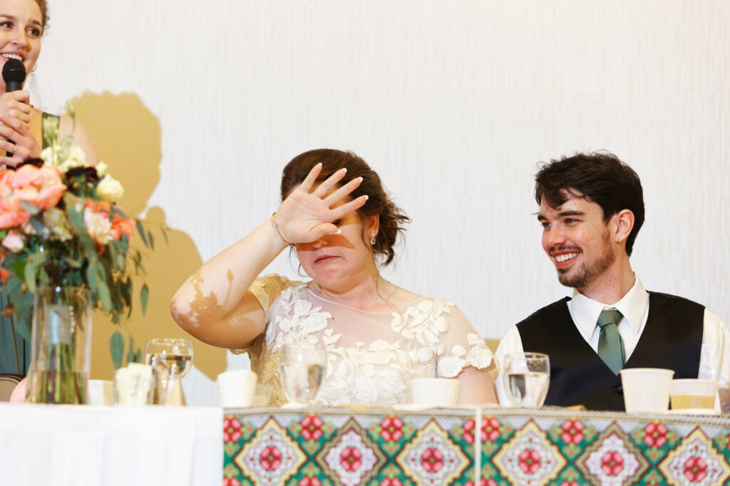 Funny direction on the bride during the toast at the Marriott Hotel Rochester MN