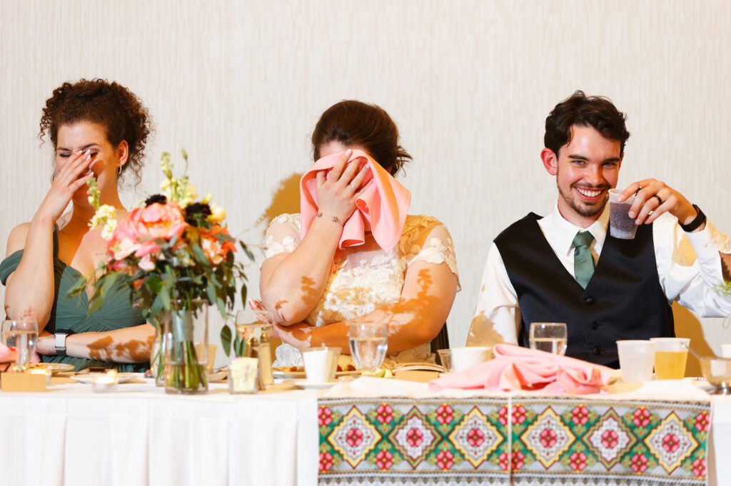 Funny direction on the bride during the toast at the Marriott Hotel Rochester MN-2