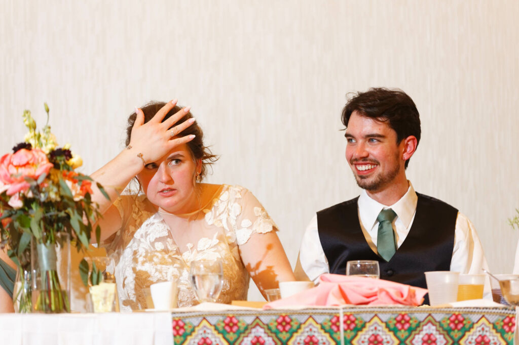 Funny direction on the bride during the toast at the Marriott Hotel Rochester MN-4