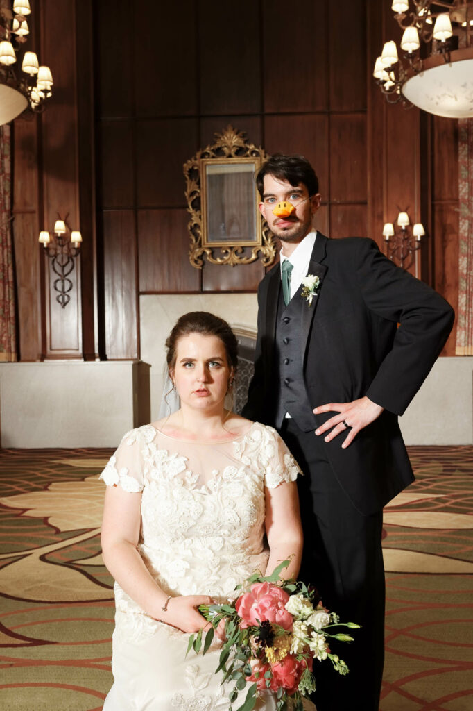 Silly picture of the bride and the groom, mocking their parents wedding photo