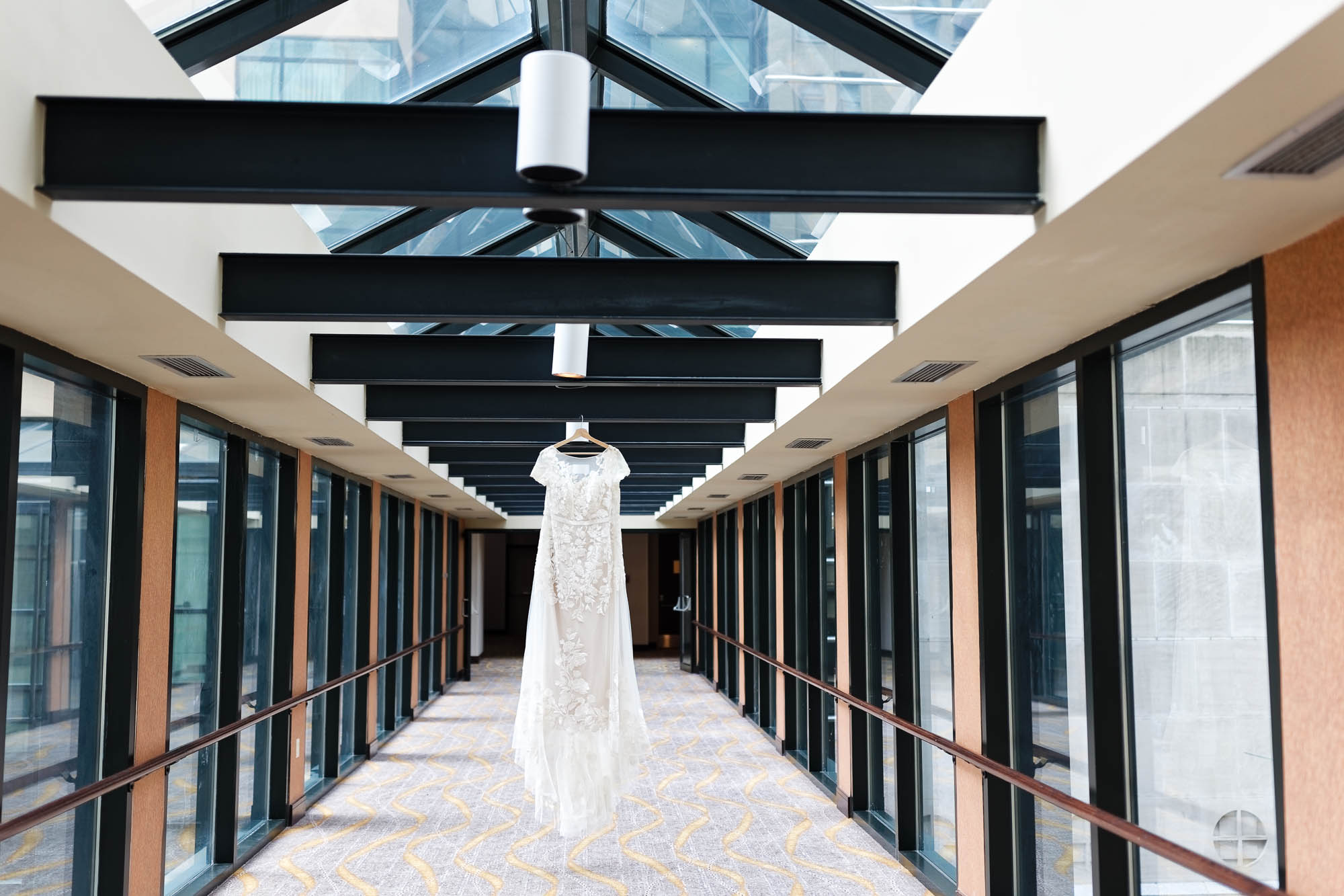 Wedding dress hanging on Skyway between the Marriott Hotel and the Kahler grand Hotel