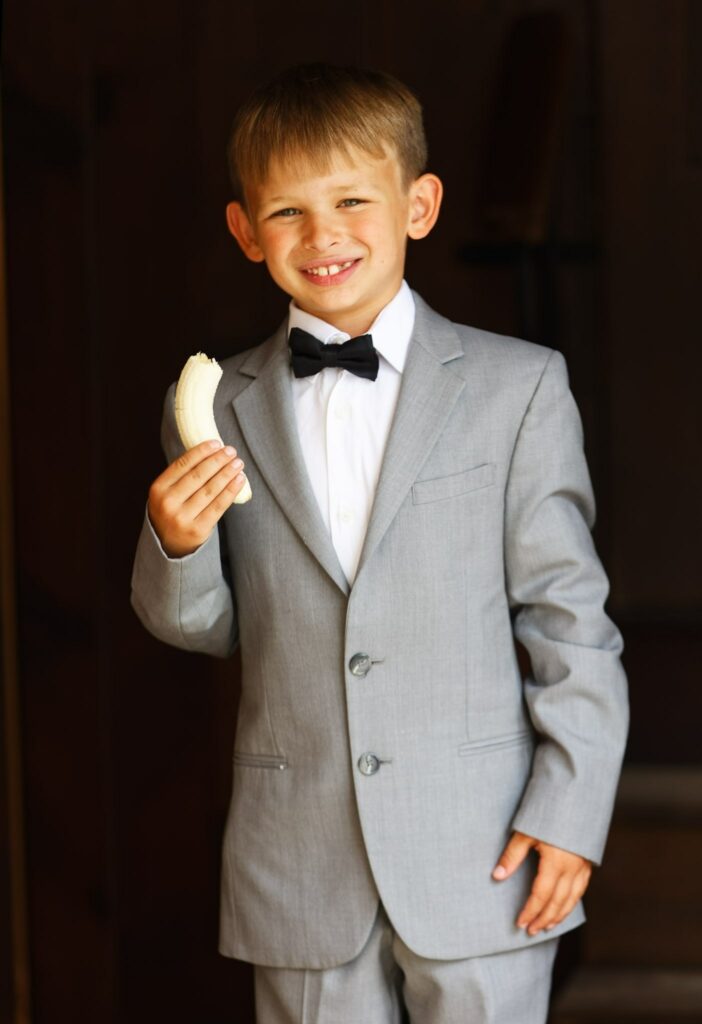 012-Ring bearer eating a banana