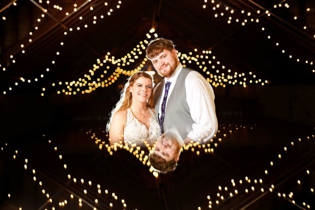 085-artistic image of bride and groom at the loft mayowood stone barn