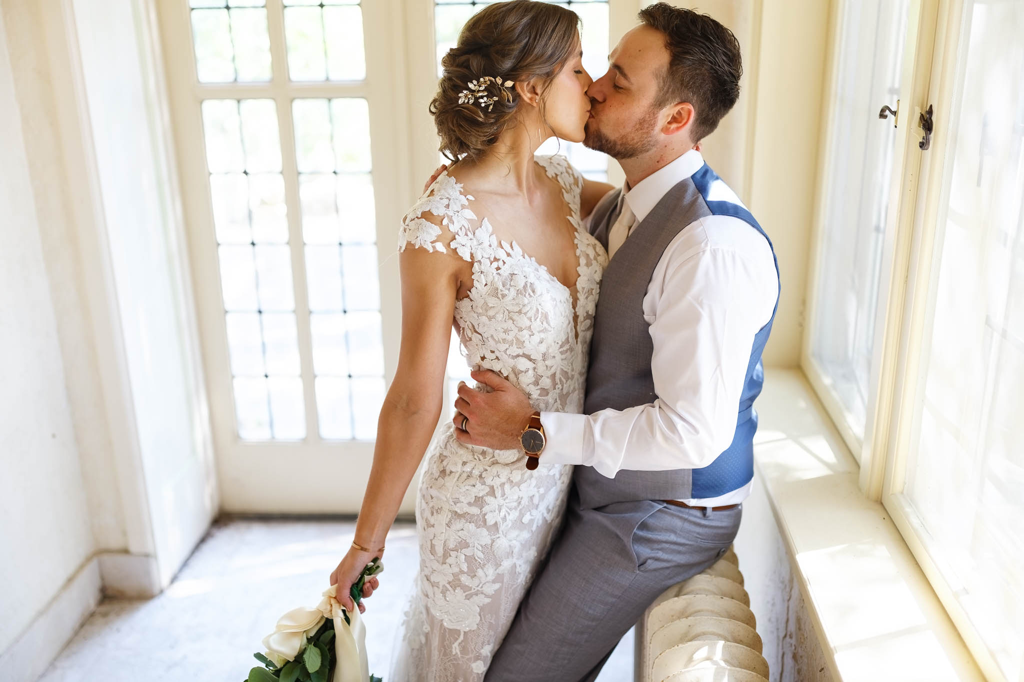 bride and groom at plummer house sun room