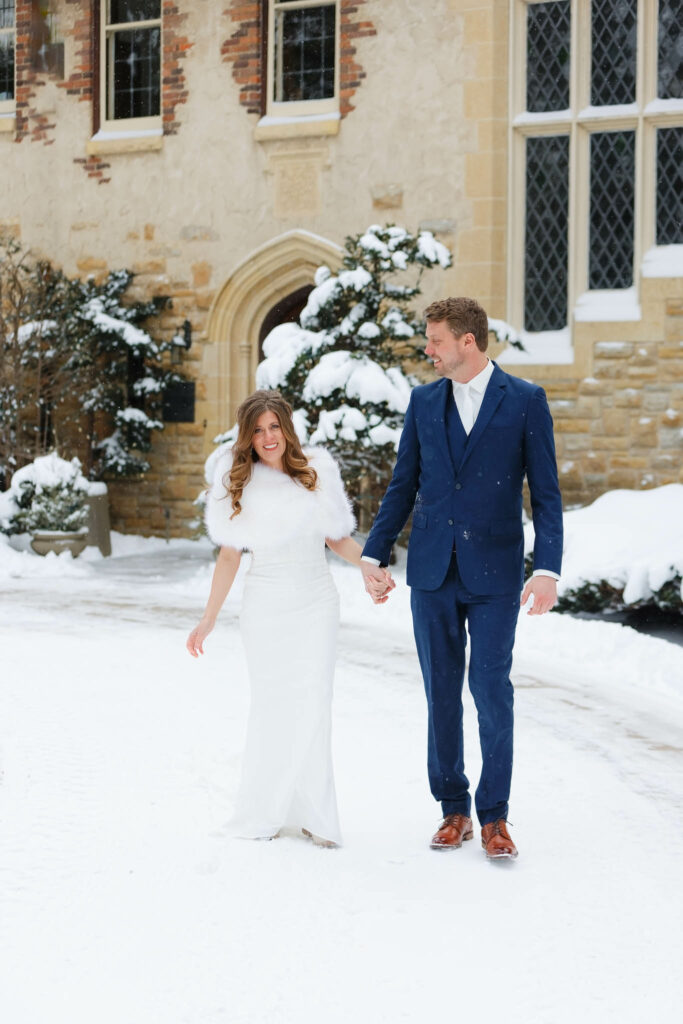 Bride and groom, walking on the snow