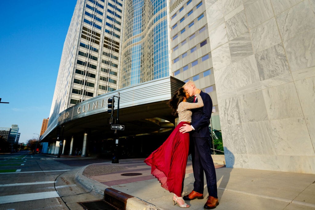 Couple kissing in front of Mayo Clinic Gonda Main Entrance Rochester