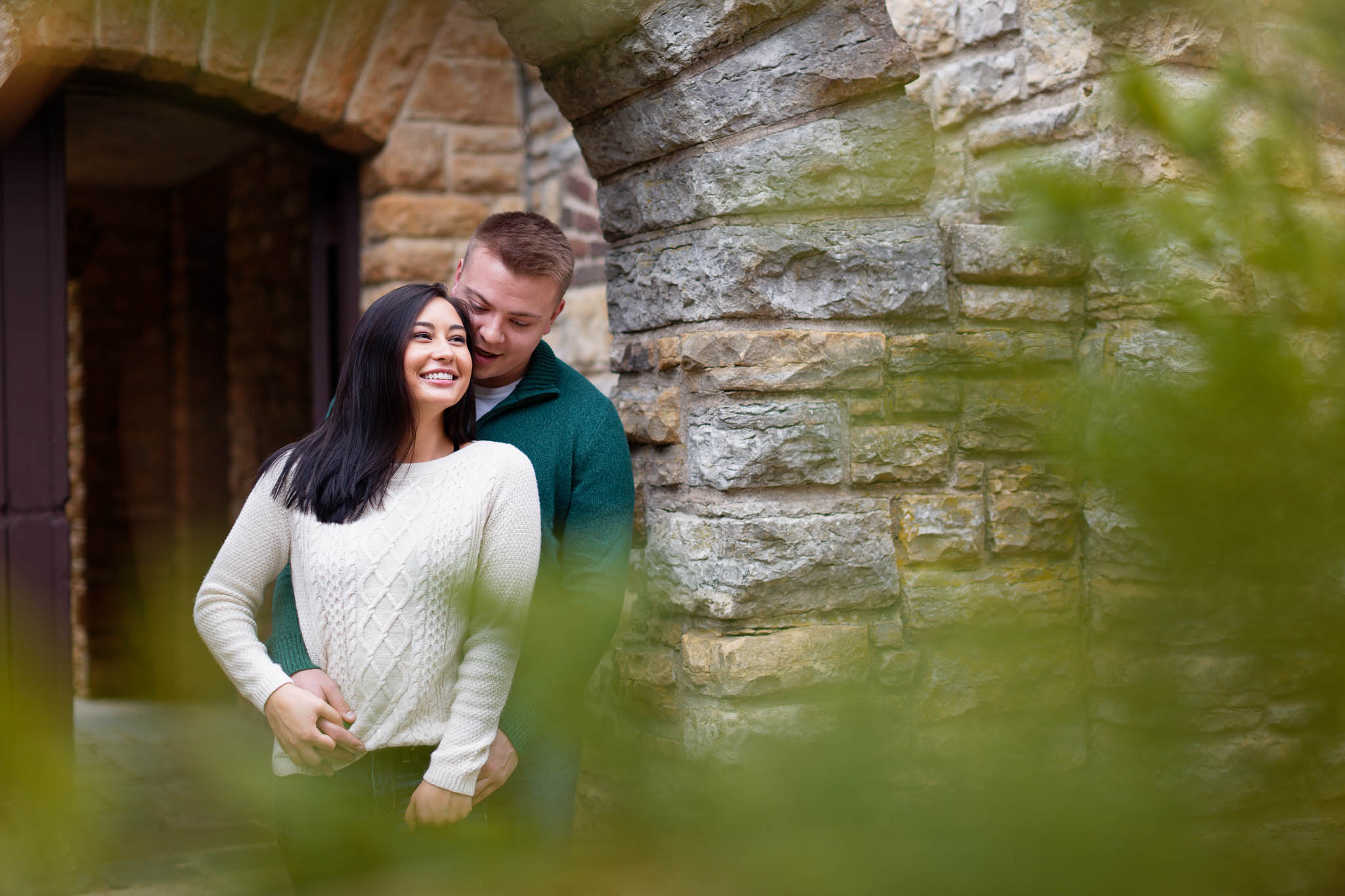 Engaged couple photo session at front Archway Plummer House