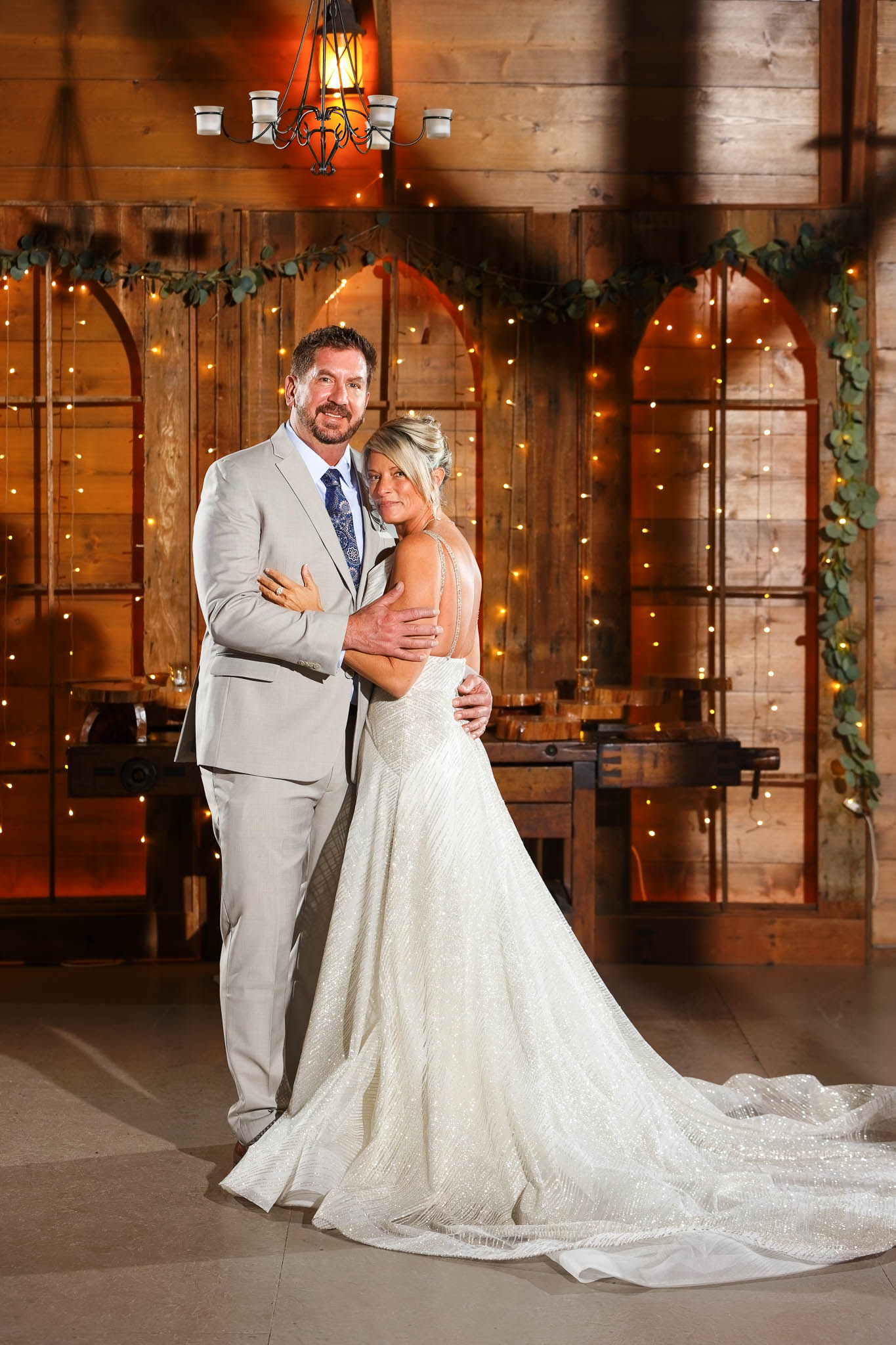 Bride and groom portrait at Pond view Barn wood wall