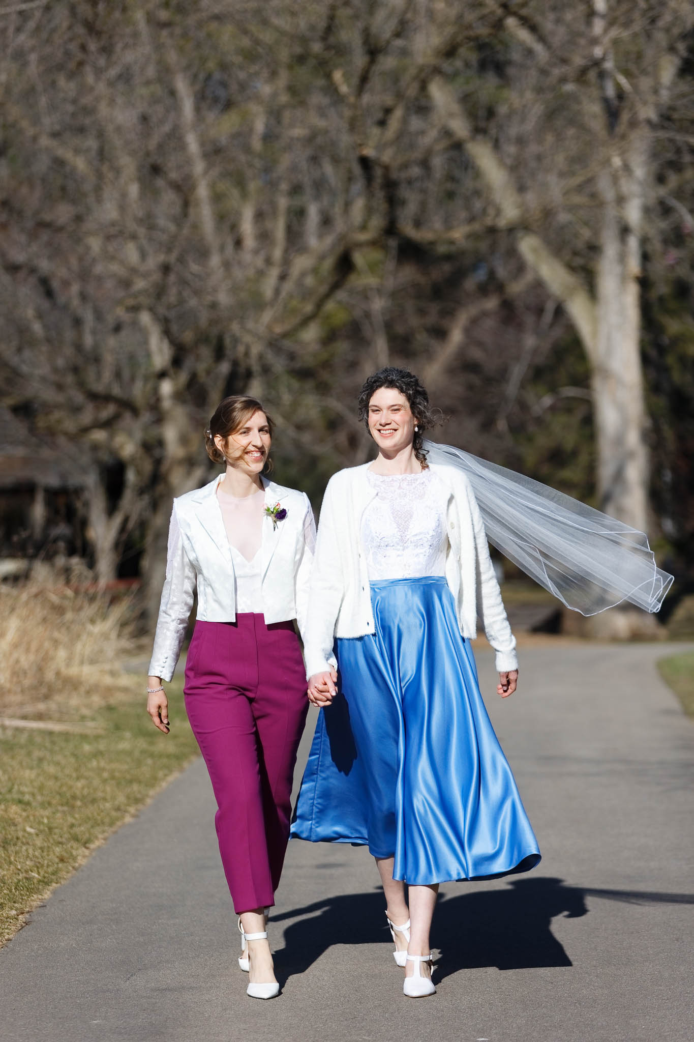 bride and bride walking quarry hill park rochester mn