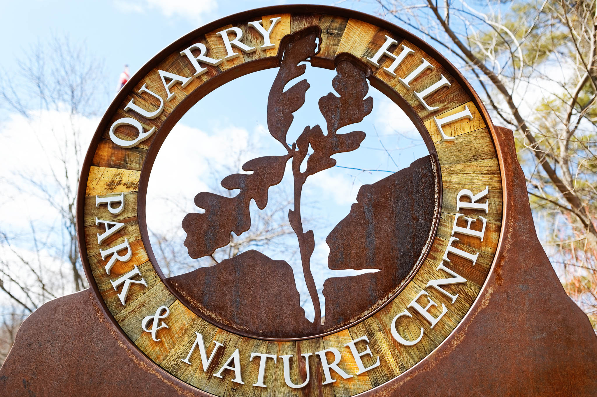 quarry hill partk & nature center logo