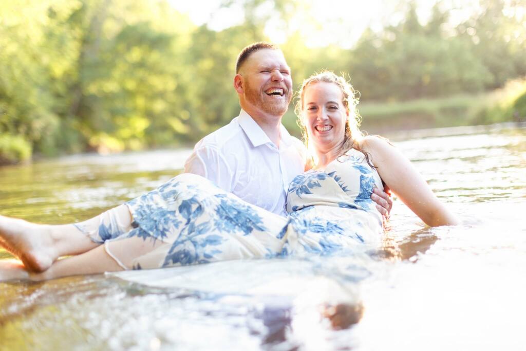 Couple playing in root river-9