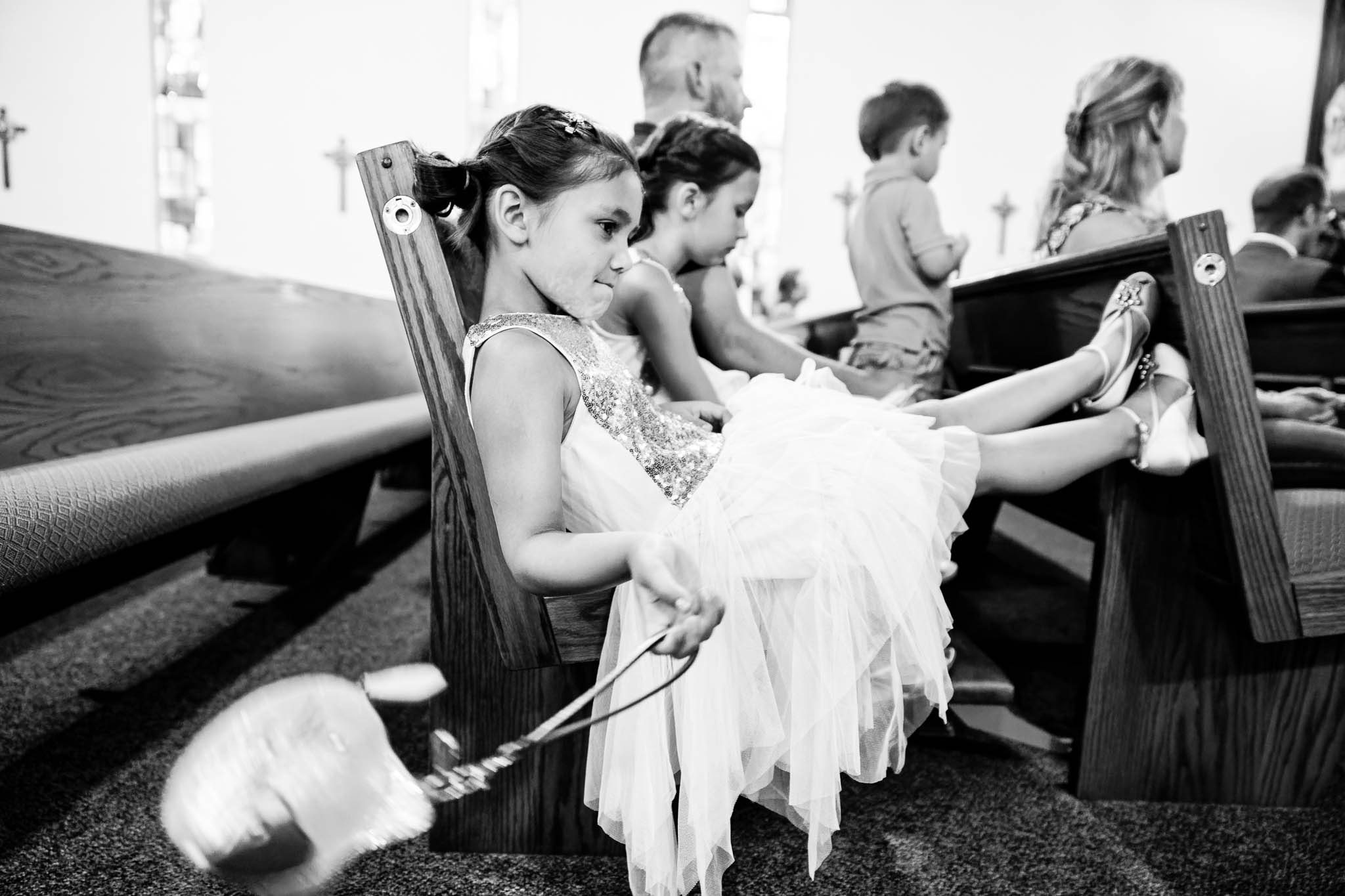 funy photos of kids Misbehaving during wedding ceremony at Saint Peter and Paul Catholic Church Mazzepa MN-3