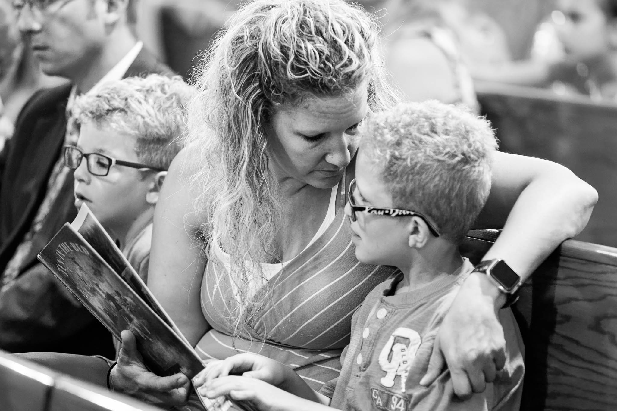 funy photos of kids Misbehaving during wedding ceremony at Saint Peter and Paul Catholic Church Mazzepa MN-5