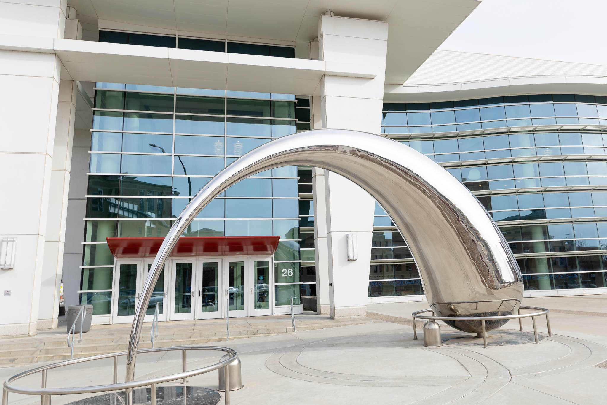 Tapered Arch-Shaped Sculpture by artist Po Shu Wang in front of Mayo Civic Center Rochester MN