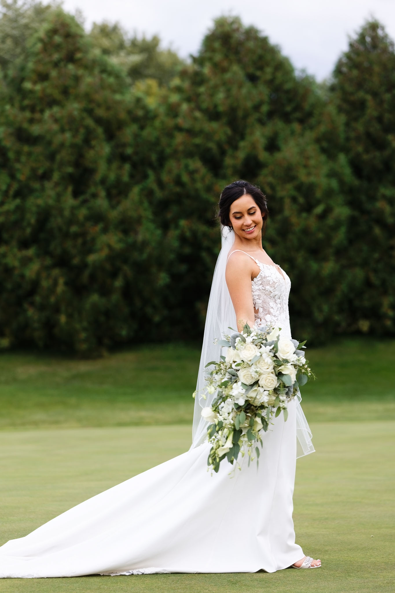 bride alone looking her trail