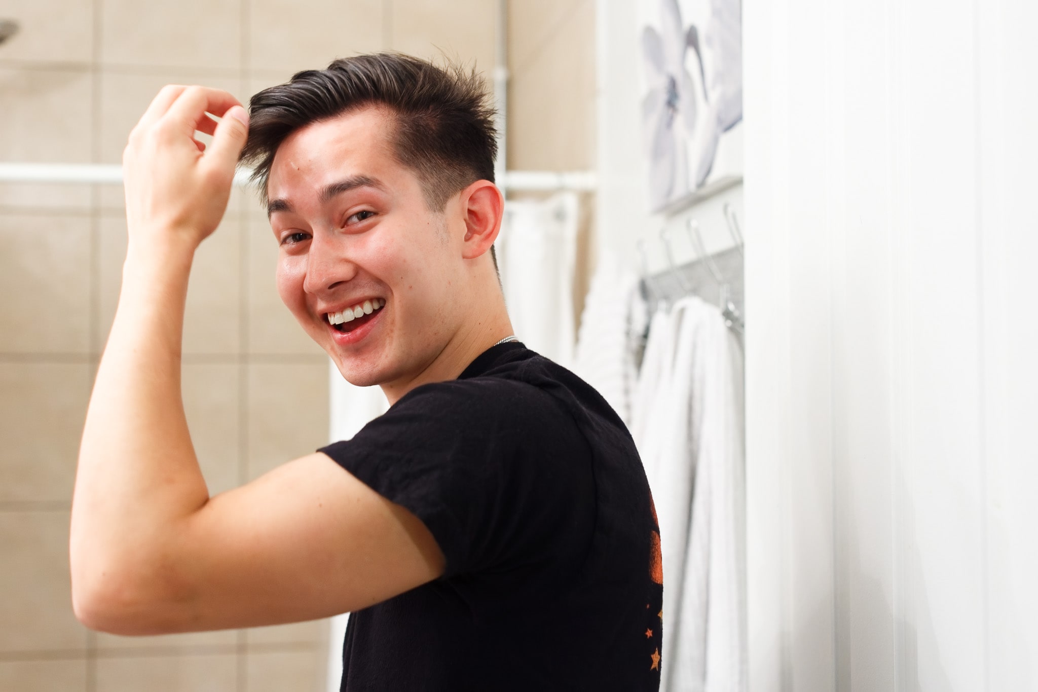 brother fixing his hair