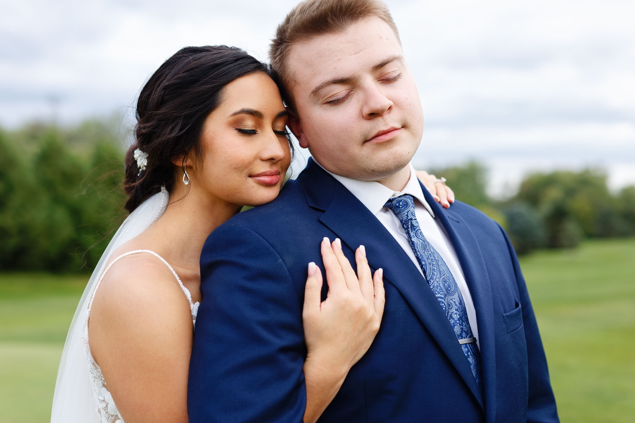 couple hugging with open view