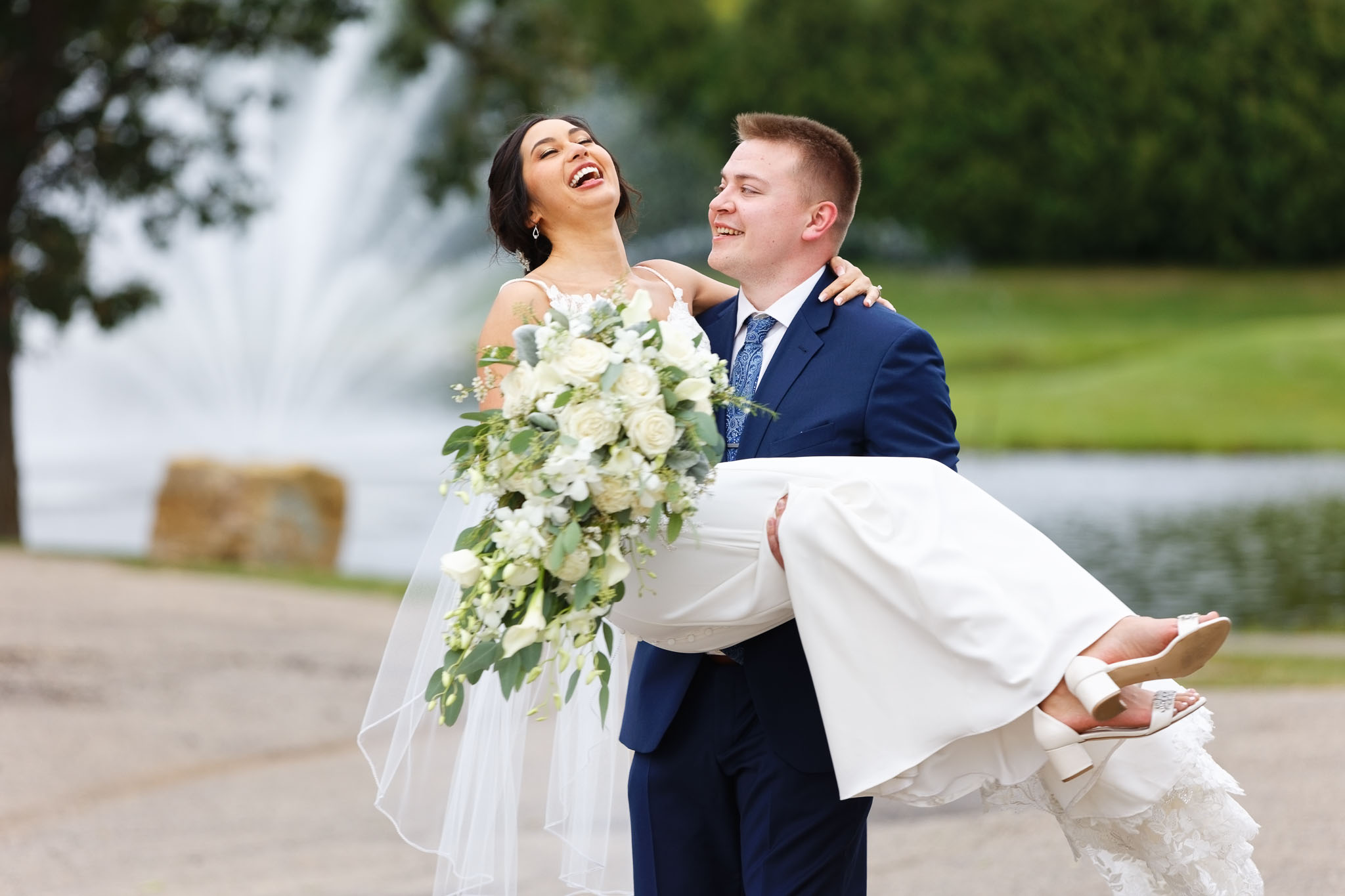 groom carying the bride