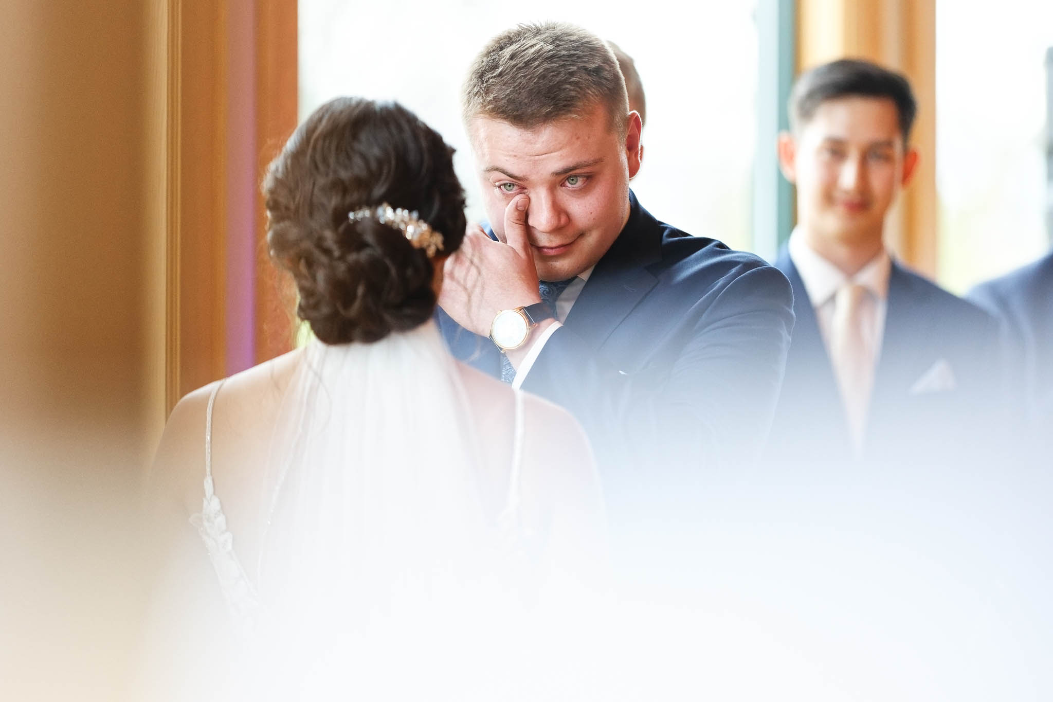groom crying during ceremony