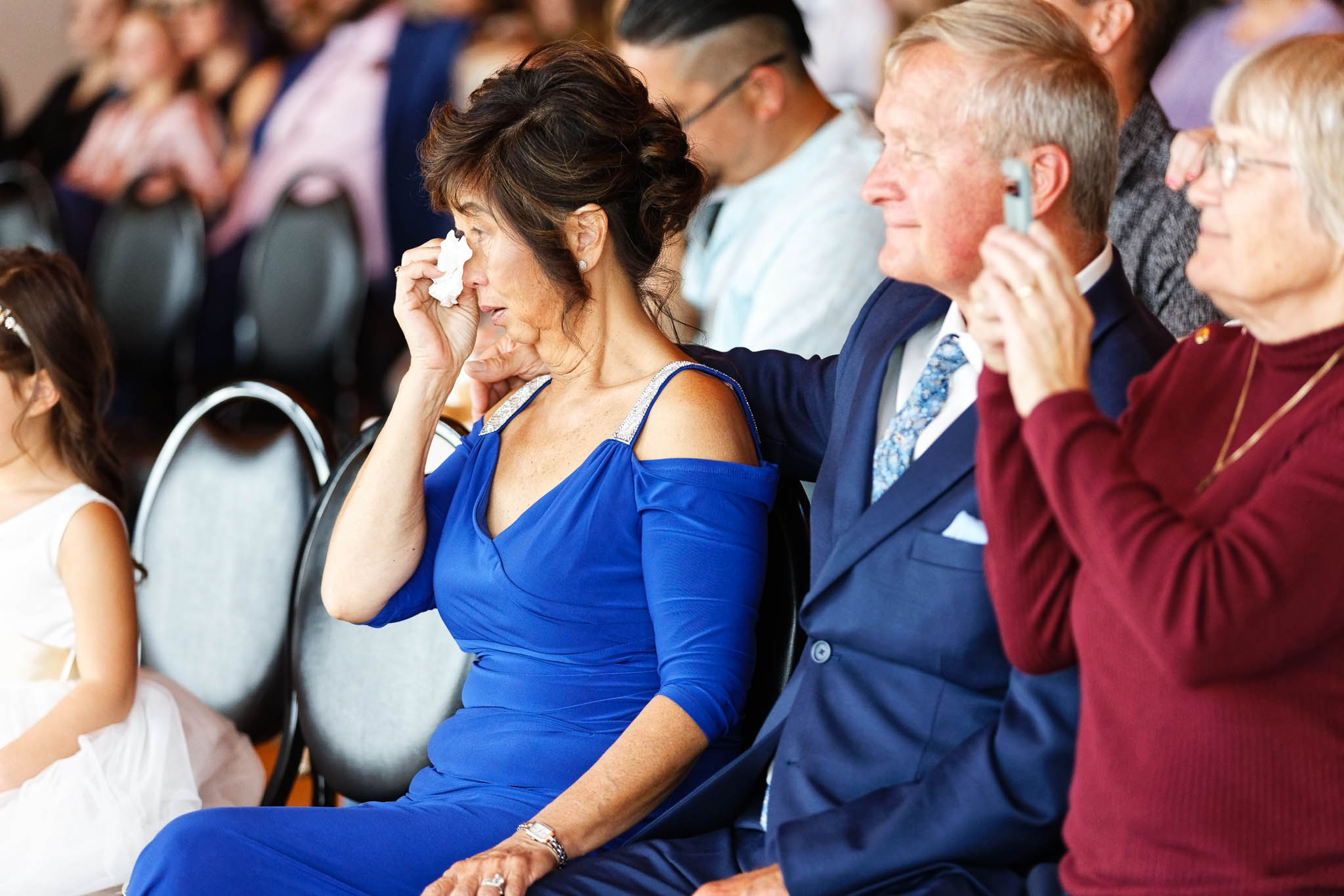 Parents crying during ceremony