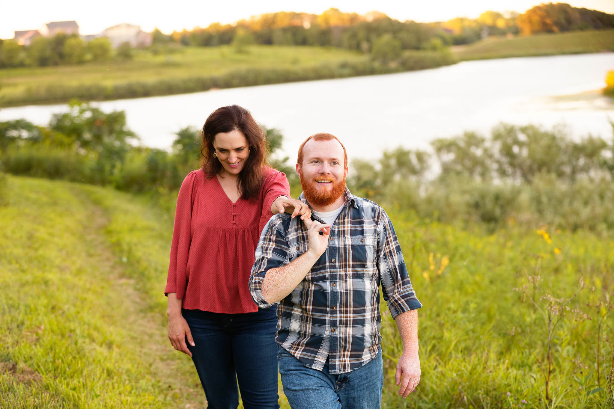 An engagement photo shoot in Rochester Minnesota summer at Willow Creek Reservoir and his lake parie area