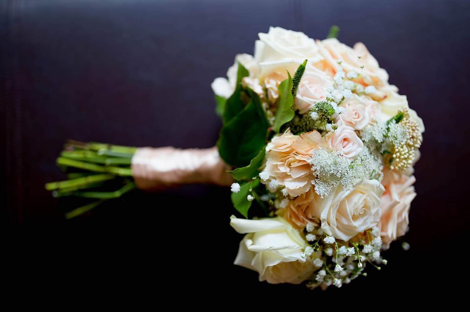 aster cafe wedding minneapolis Bright roses on dark background