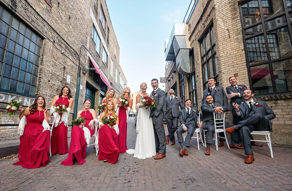 funny wedding party in the street bridemaid red dresses