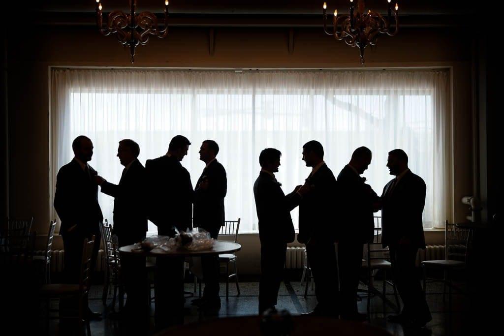 groom and groomsmen getting ready silhouette photo at the loring social 