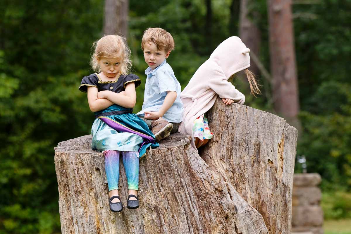 candid outdoor photography of upset kids on wedding