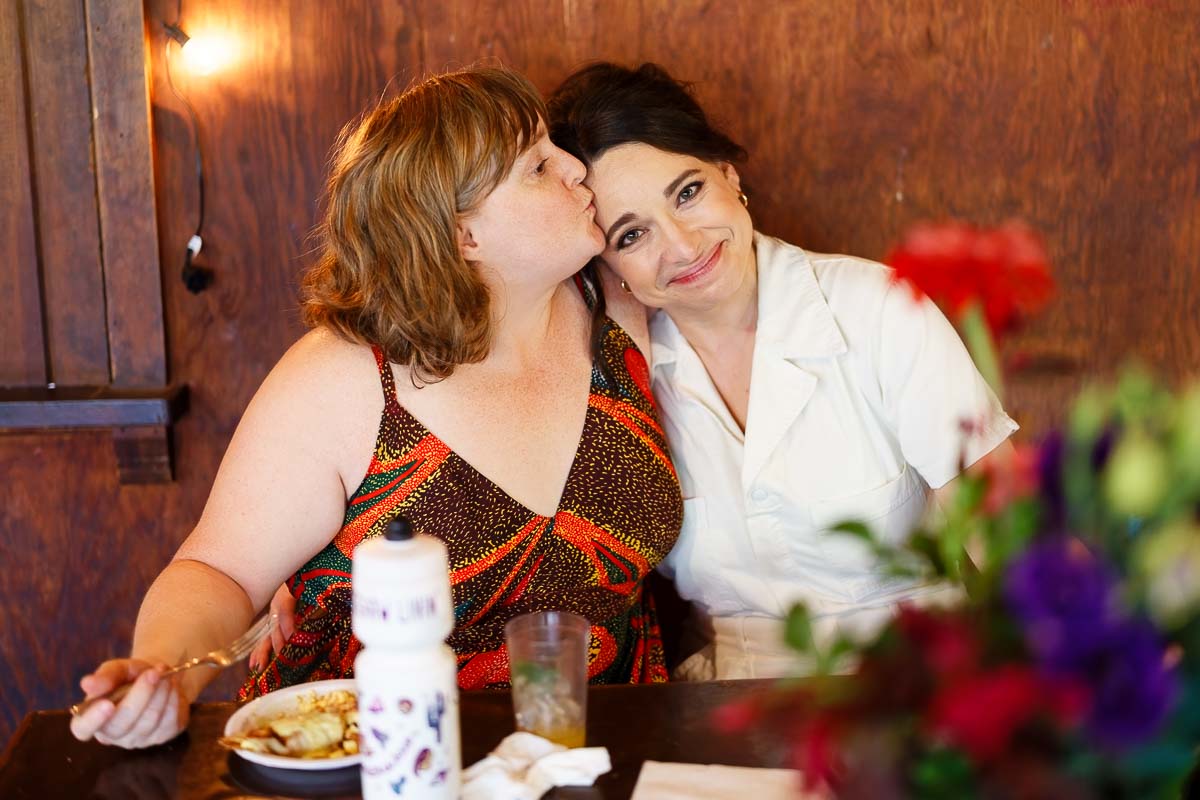 guess kissing the bride during brunch at group center in st croix state park