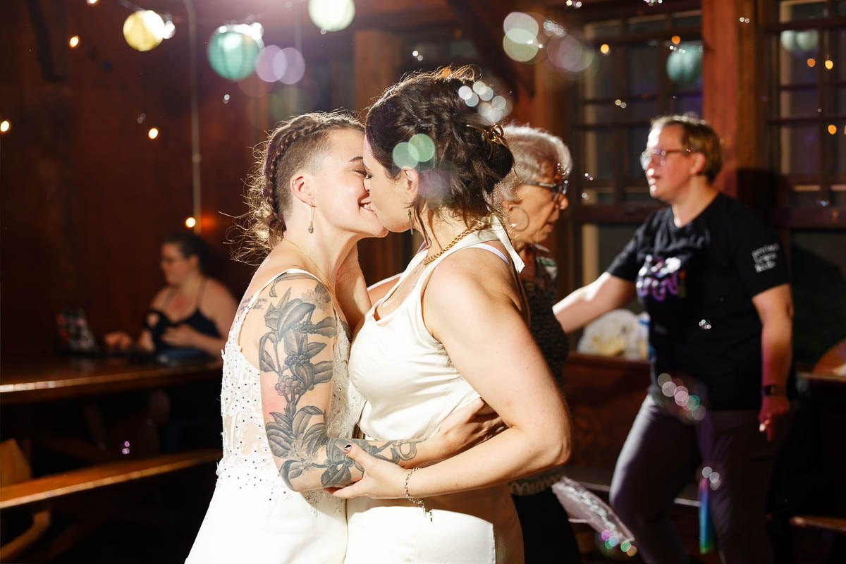soap bubbles and dancing at night shelter party, minnesota outdoor wedding reception, documentary wedding photography]