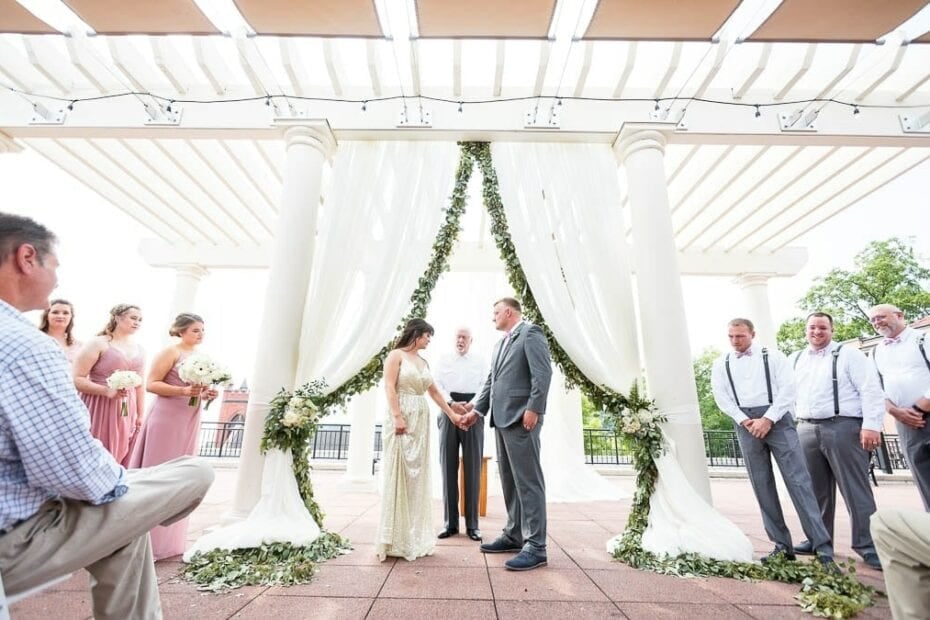 stillwater public library wedding couple standing on rooftop for ceremony
