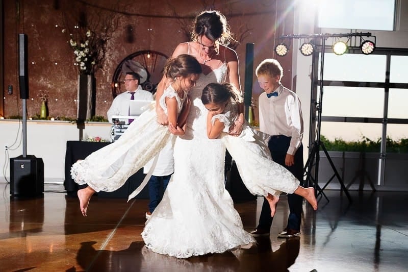 bride and nieces dancing