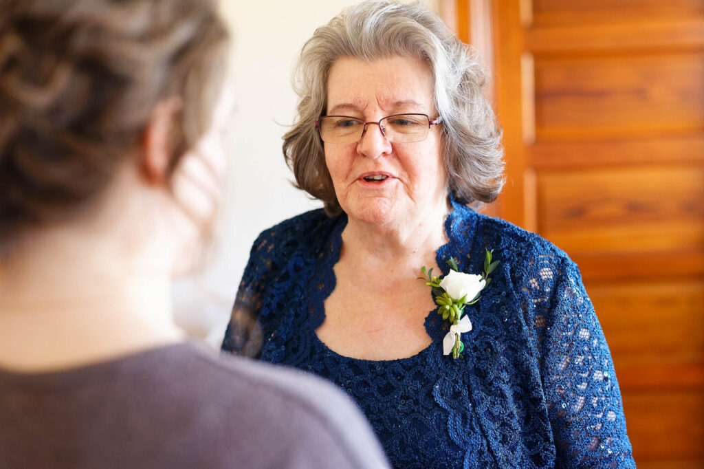 mother of the bride with boutonniere