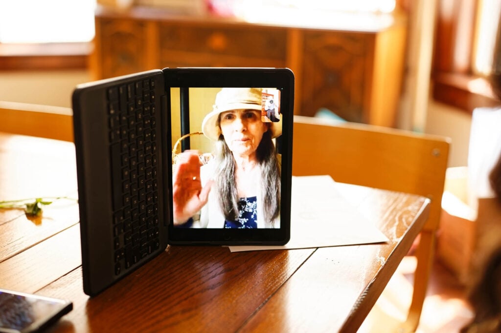 Groom’s parents attending the wedding from afar via video call