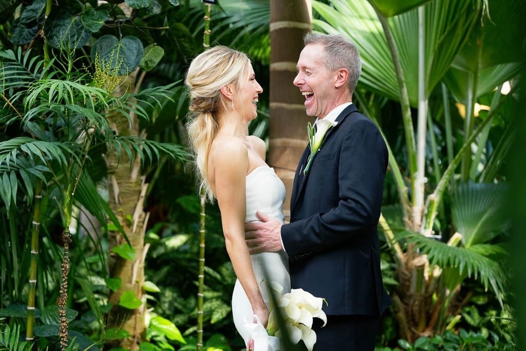 marjorie mc nelly conservatory brid and groom laughing