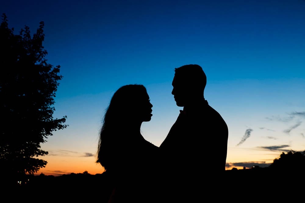 couple with view on minneapolis during twilight