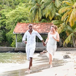 fast delivery couple running on the beach