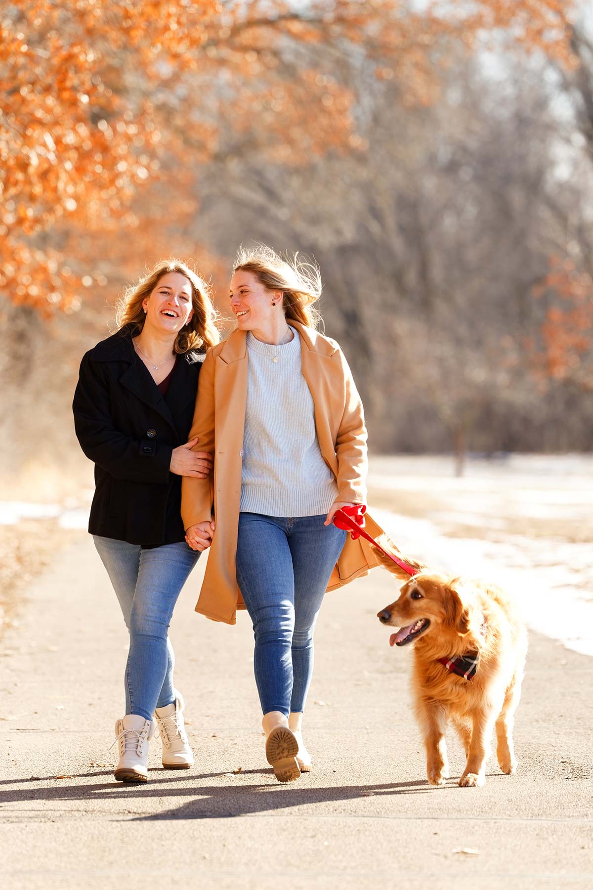 lesbian-couple-engagement-photo-session-with-golden-retriever