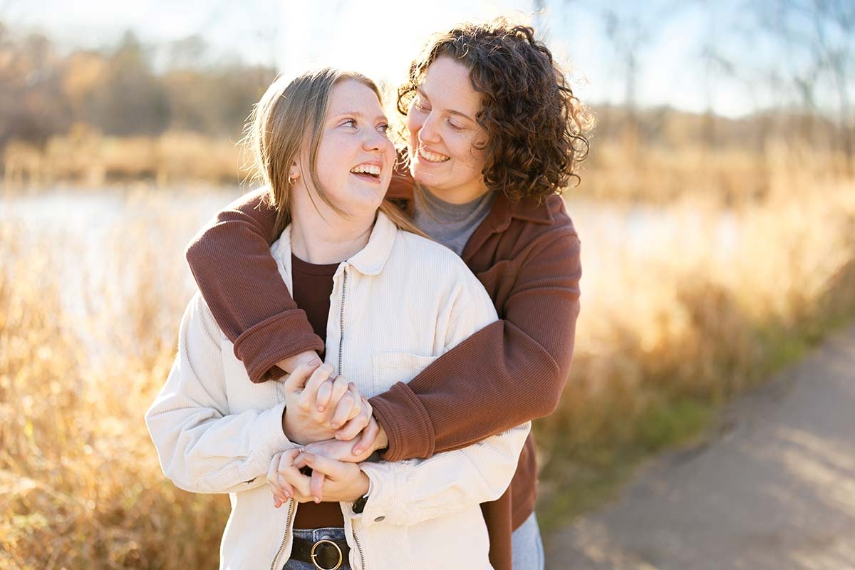 woman-hugging-and-laughing