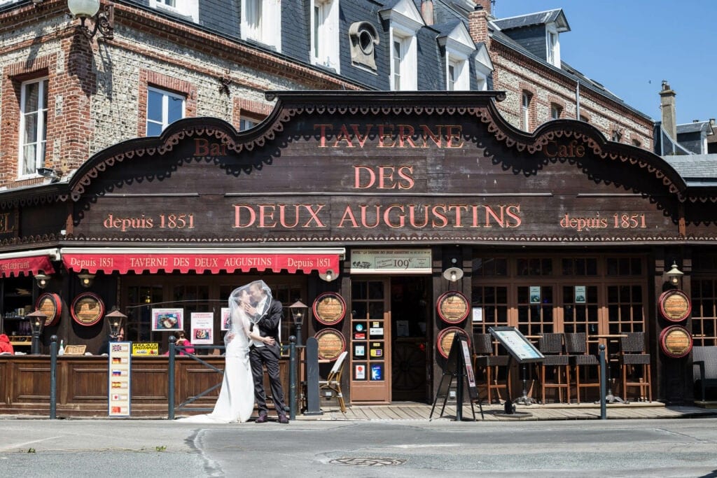 couple in front old restaurant