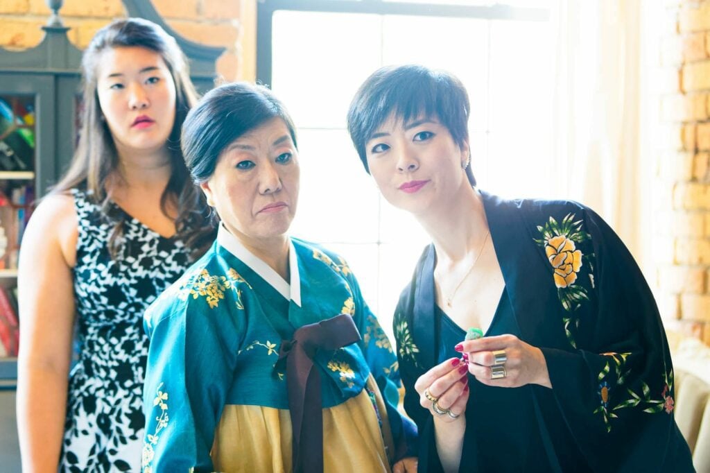 family looking at the bride