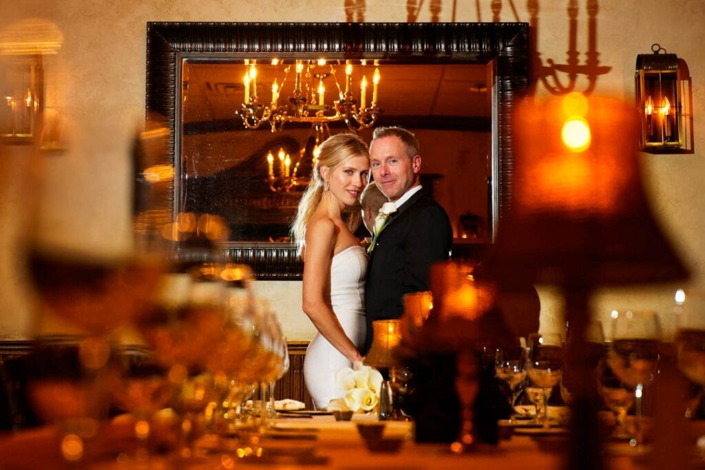 staged image of a bride and groom in a restaurant